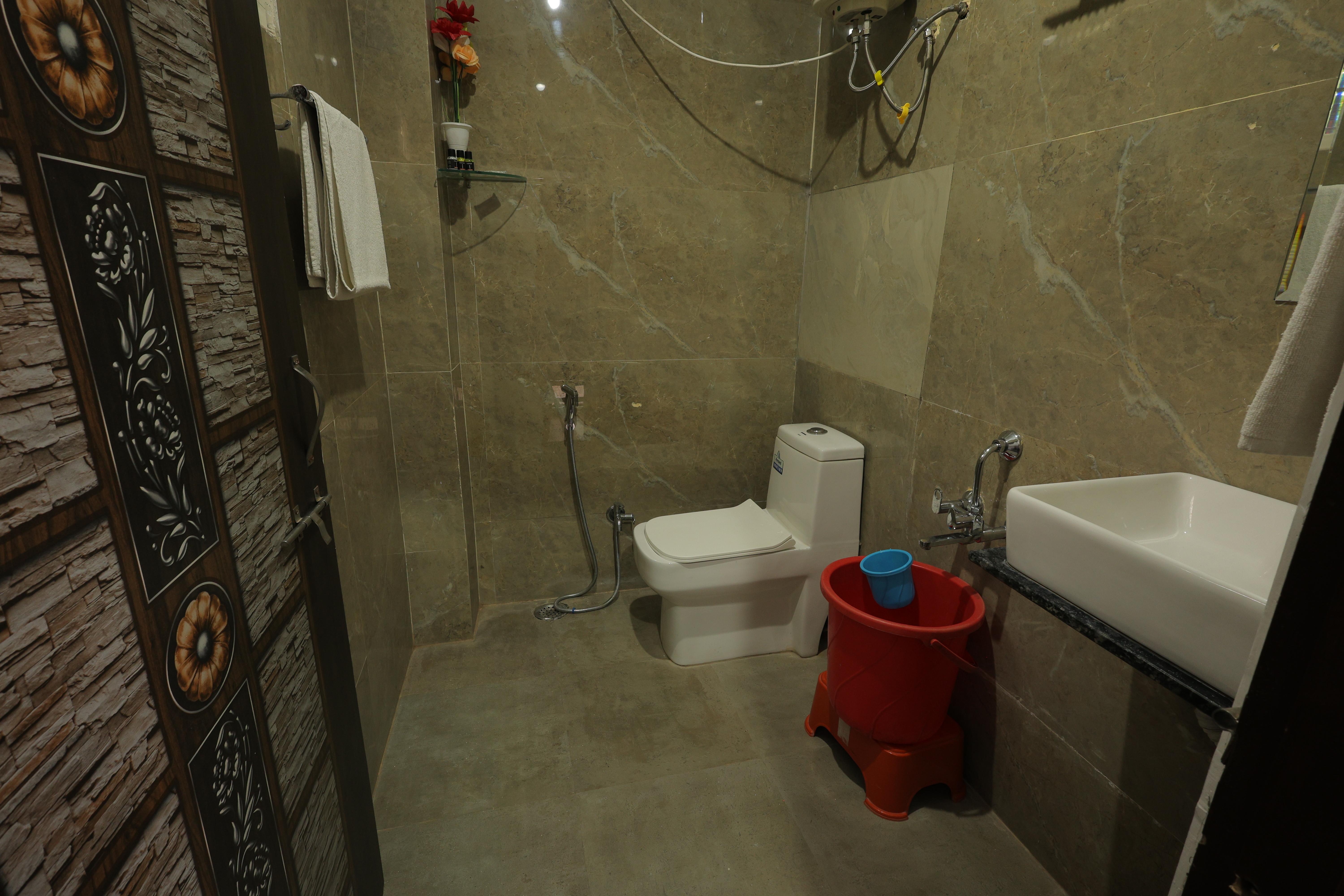 Modern &amp; Hygienic Bathroom at Nature Nest Hotel &amp; Resorts 🛁✨  Experience comfort and cleanliness in this well-maintained and spacious bathroom, designed for a refreshing and hassle-free stay. 