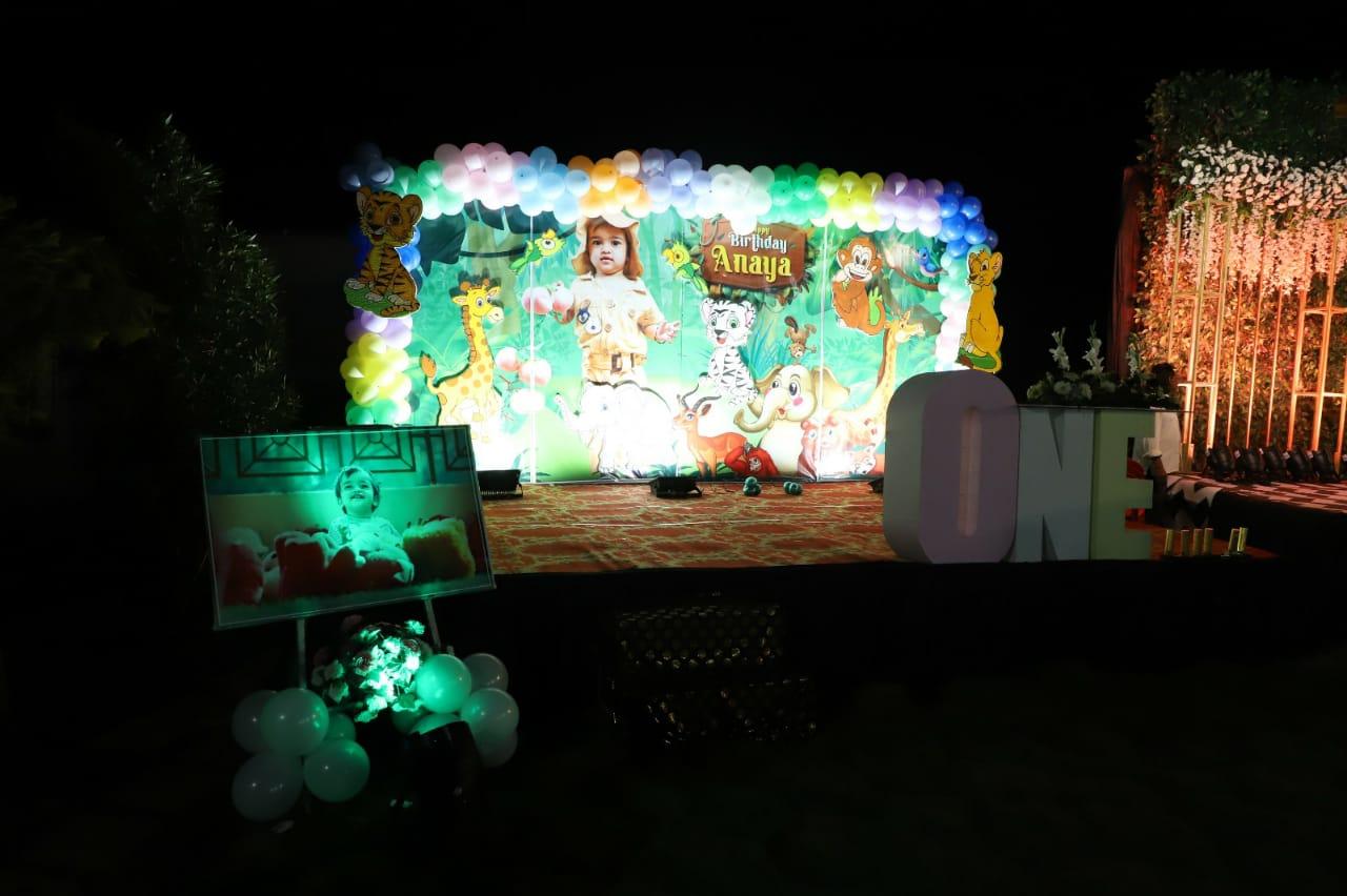 This beautiful marigold-adorned entrance sets the perfect tone for a traditional celebration. The vibrant floral decor, hanging bells, and intricate details create a warm and festive ambiance, making it an ideal setting for a wedding or special occasion.